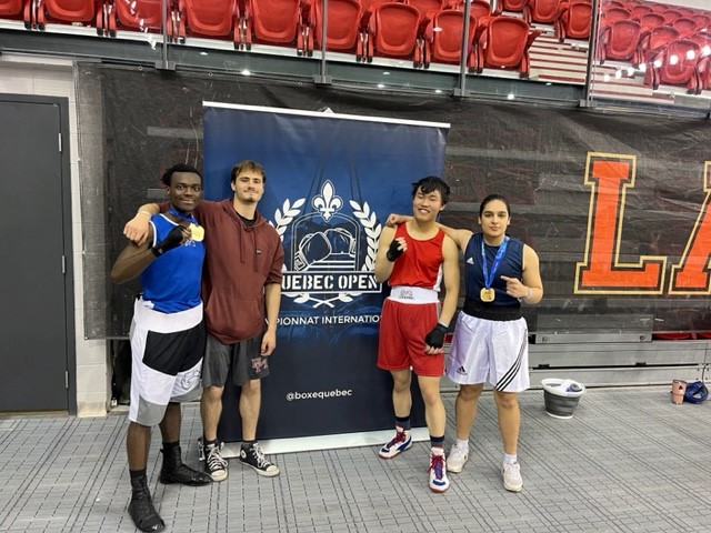 Les quatre athlètes du club ABC qui ont participé au Québec Open de boxe.